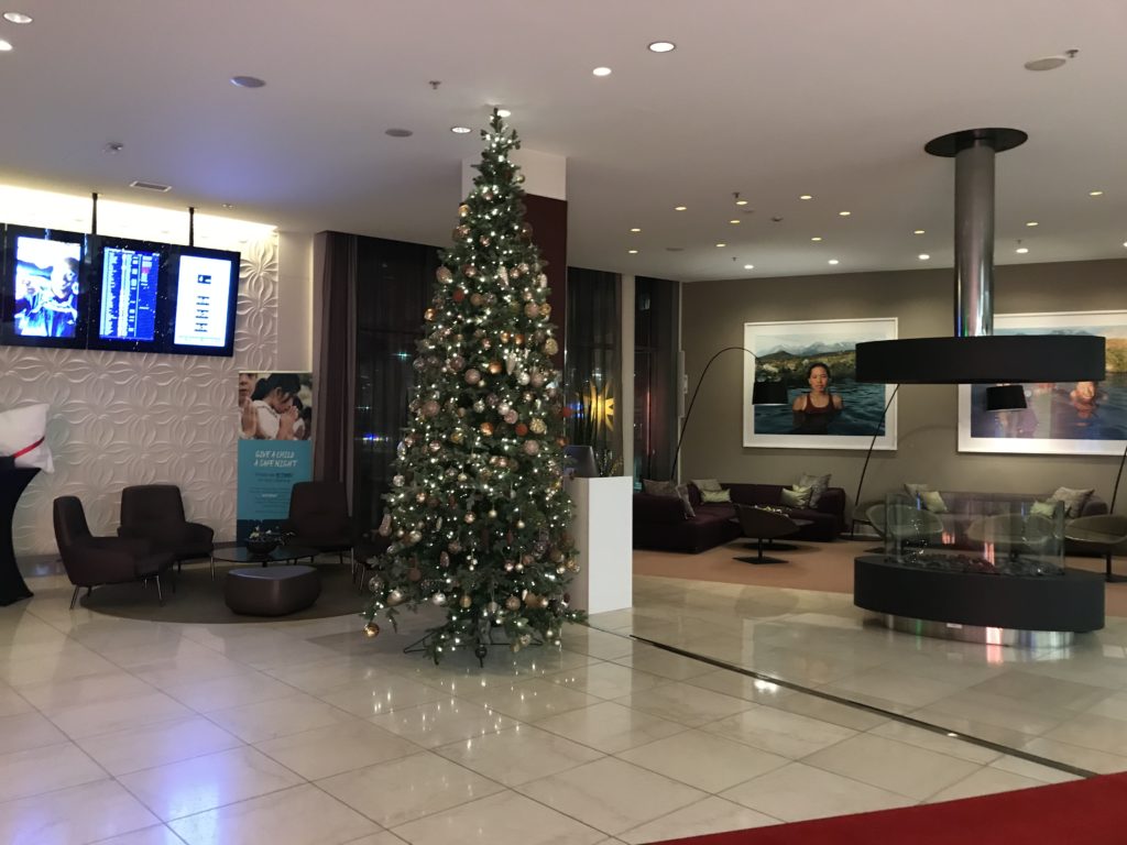 a christmas tree in a lobby