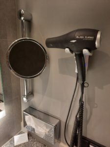 a hair dryer and a mirror