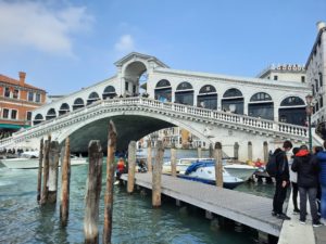 Rialto Bridge over water with people walking on it