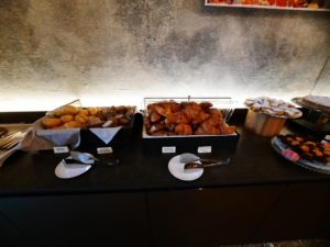 food on a counter in a buffet
