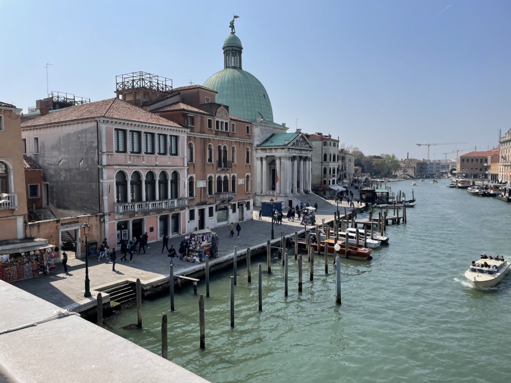 a water next to buildings