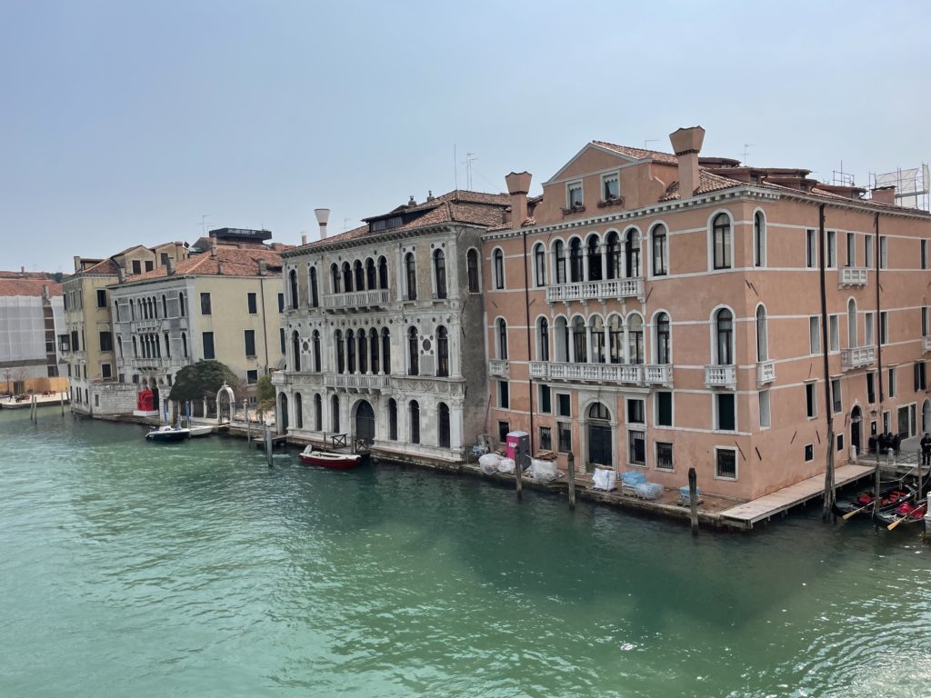 a water next to buildings with Grand Canal in the background