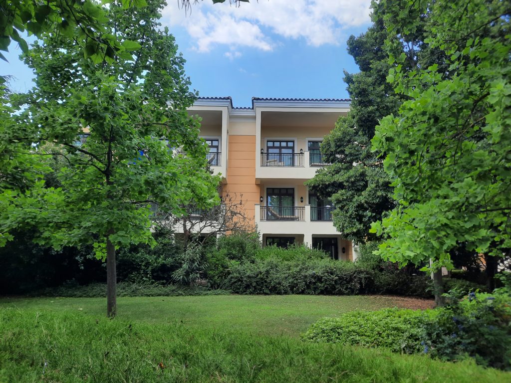 a building with trees and bushes