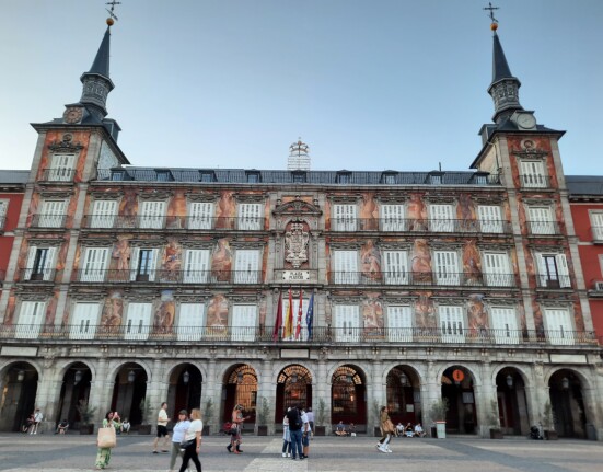Plaza Mayor, Madrid with many windows and a statue on the front