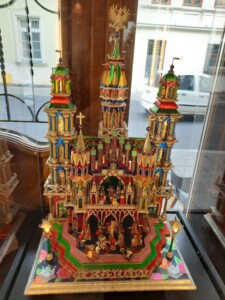 a colorful castle in a glass case