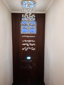 a door with a chandelier from it