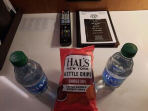 a chips and water bottles on a table