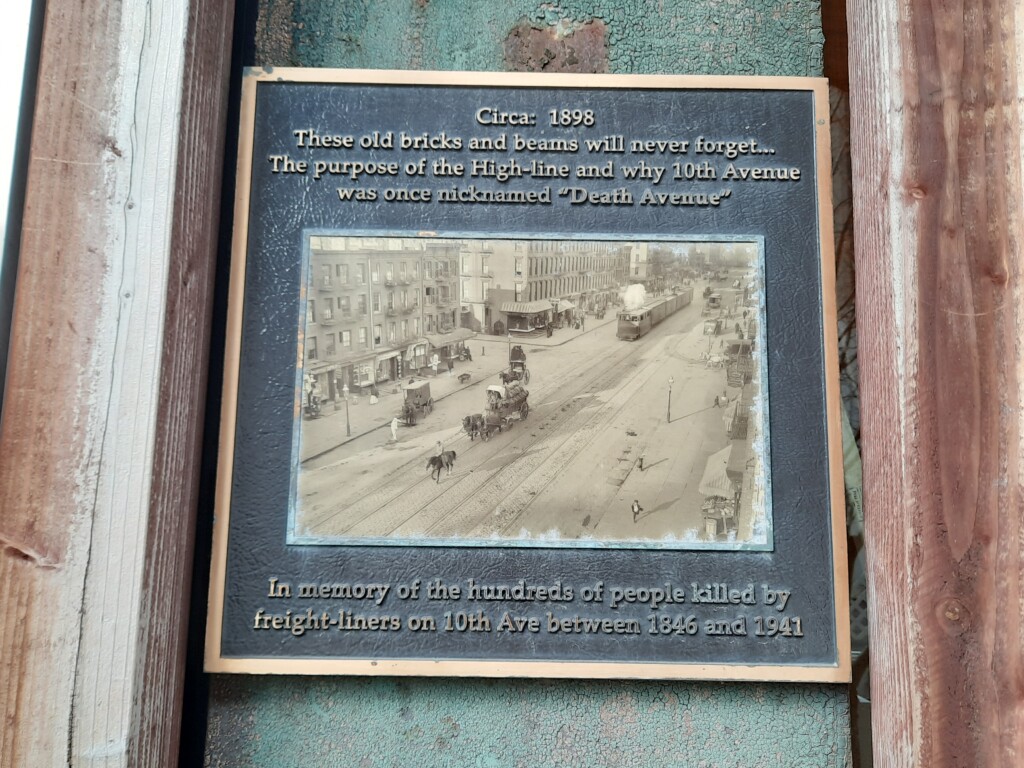 a plaque on a wood wall