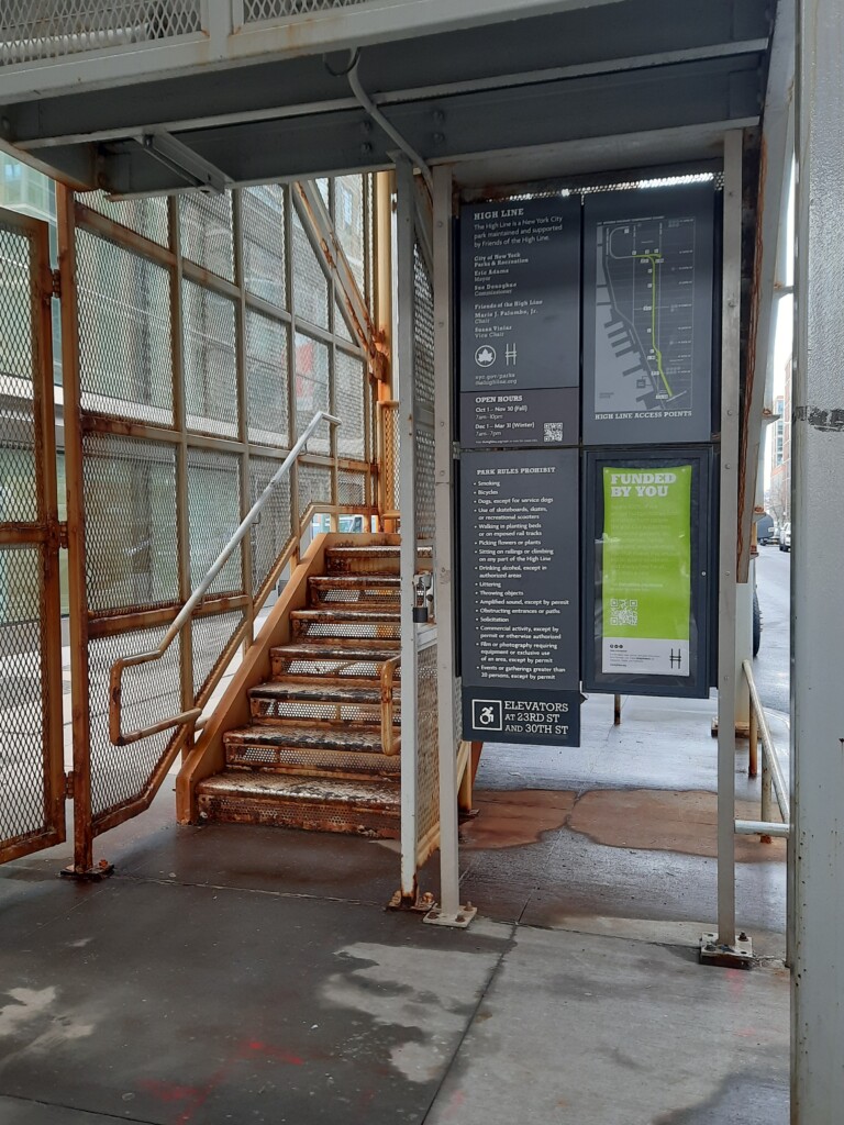 a sign and stairs in a building