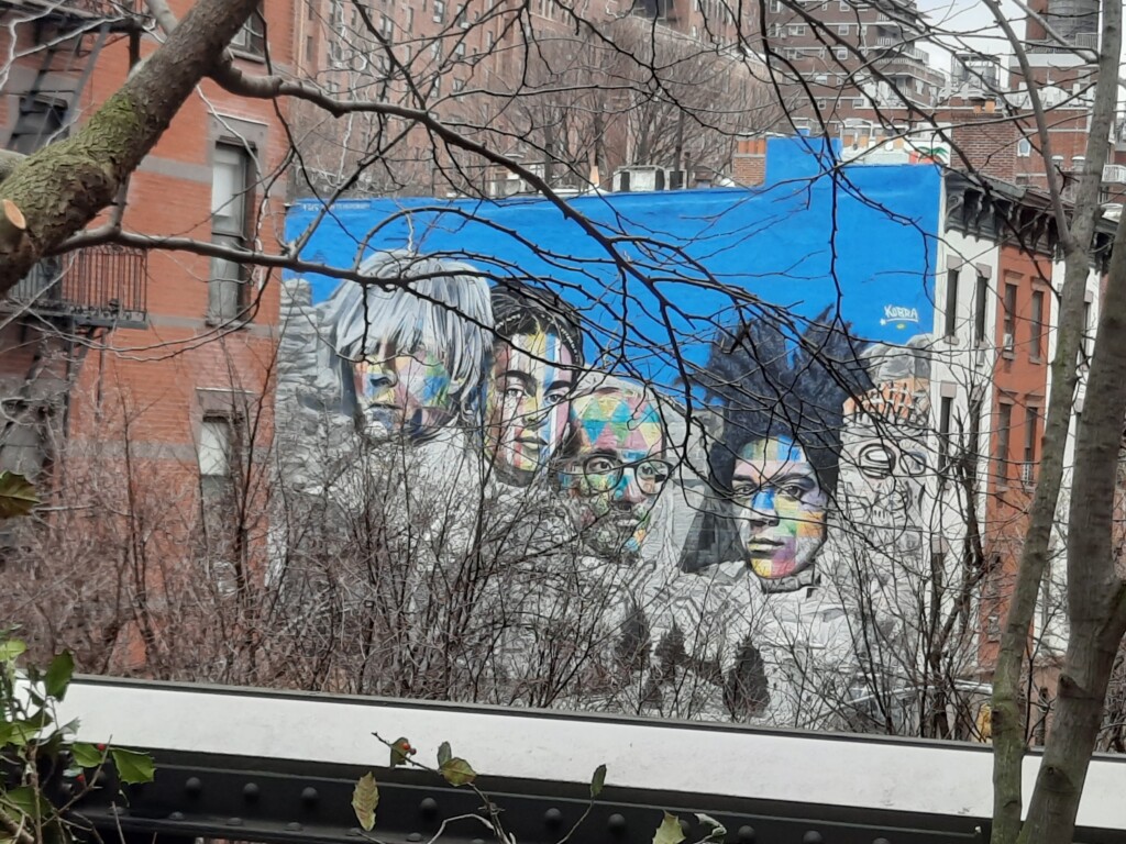 a mural of a group of people