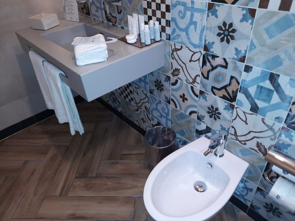 a bathroom with a sink and a toilet