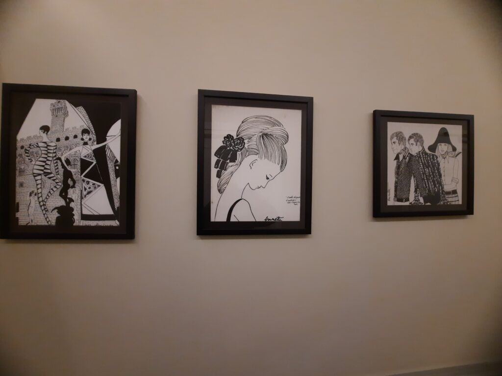 a group of pictures on a wall