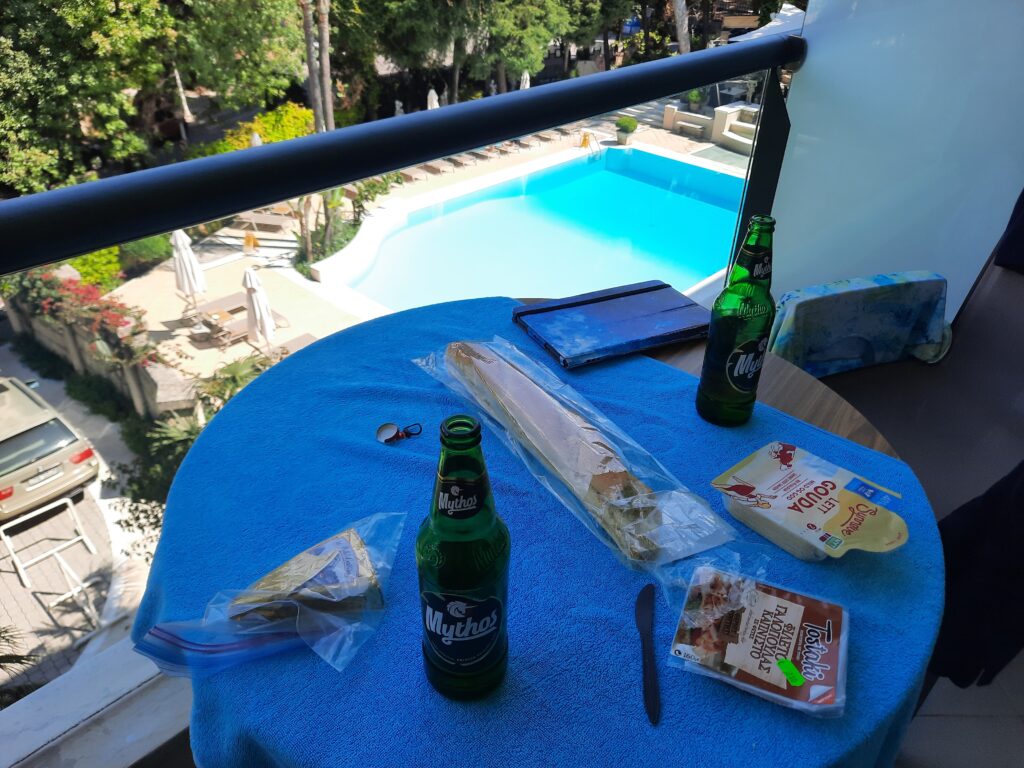 a table with food and beer on it