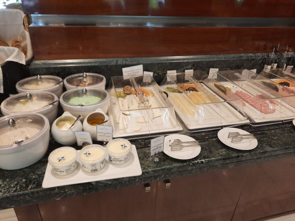 a buffet table with different food items on it