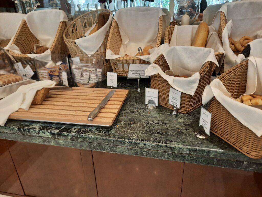 a group of baskets with white cloth on them