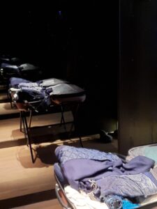 a row of beds in a room
