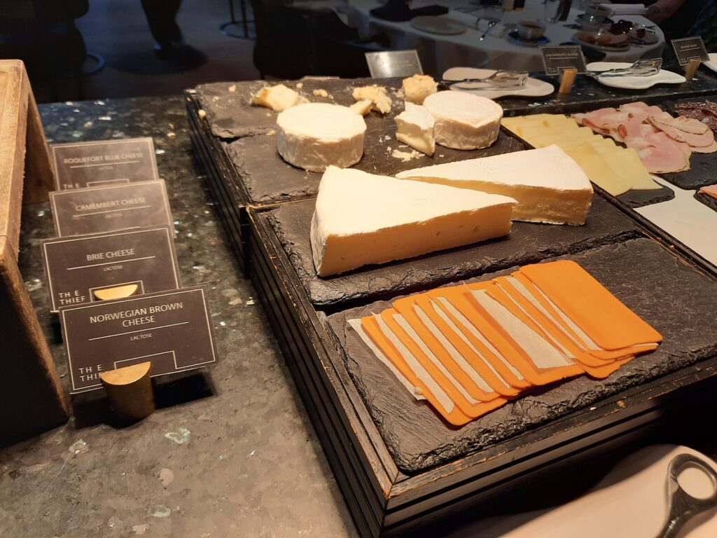 a group of cheeses on a table
