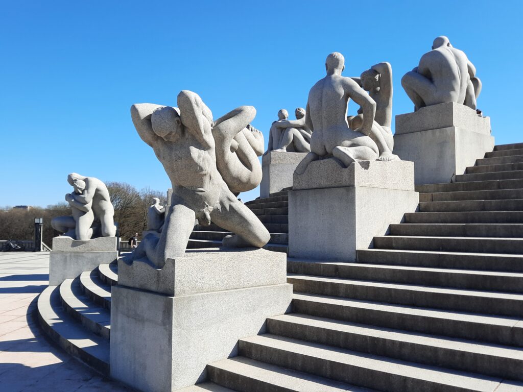 a group of statues on stairs