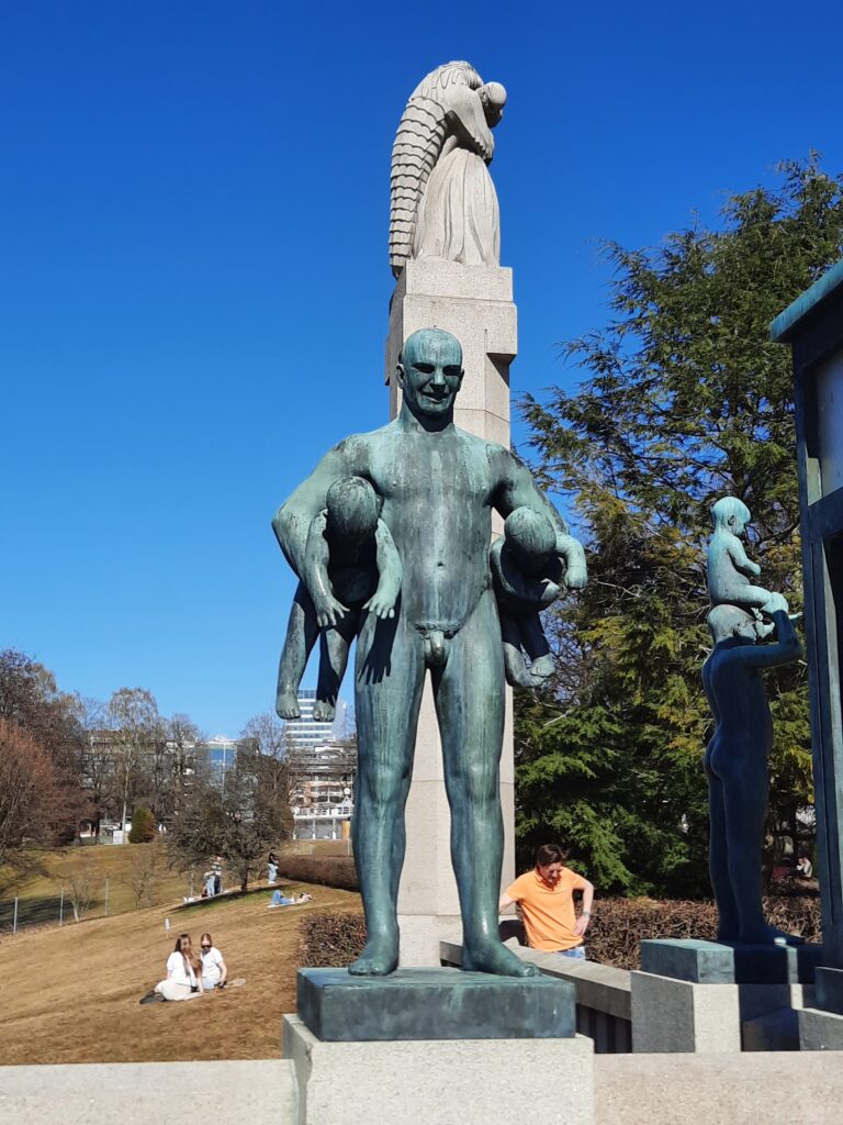 a statue of a man with a statue of a man